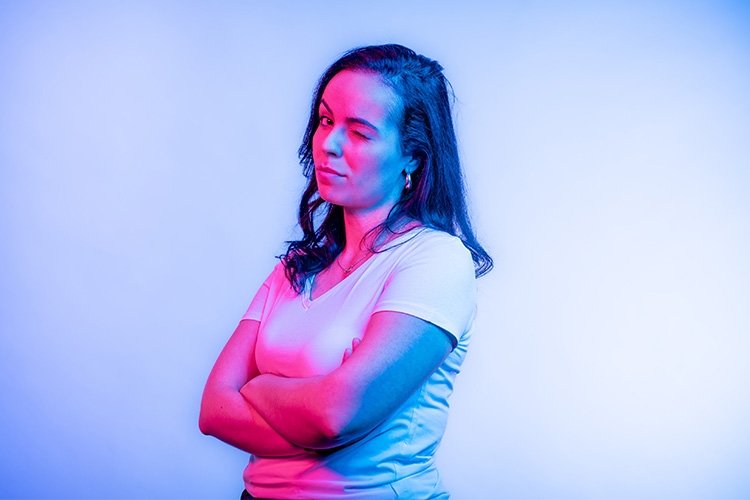 Woman winks with one eye